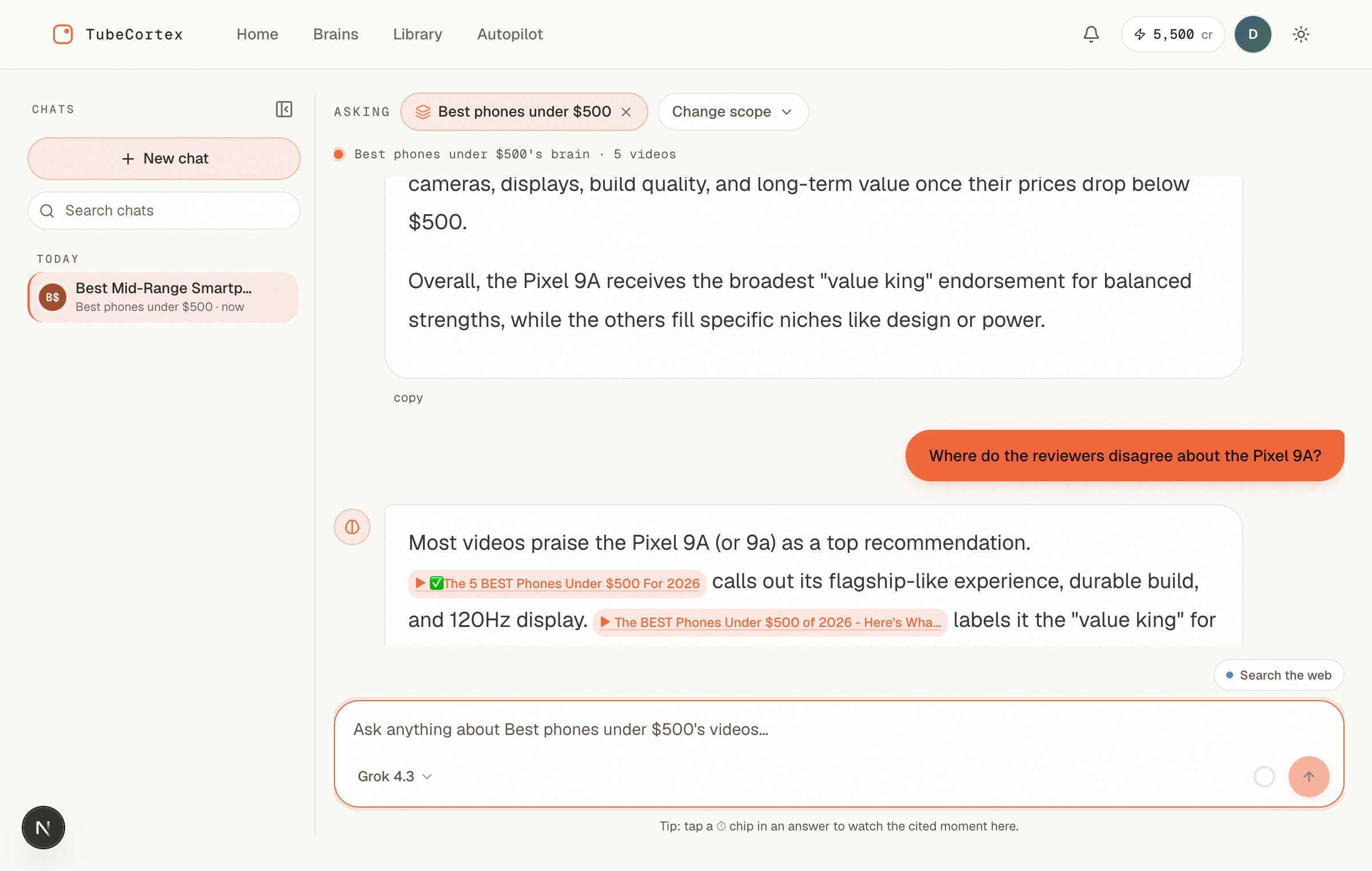 TubeCortex answer naming the Pixel 9A as the reviewers' pick, with clickable citations to each review video